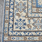 Kazak-1219930470-Blue-Beige Hand-Knotted Area Rug collection texture detail image